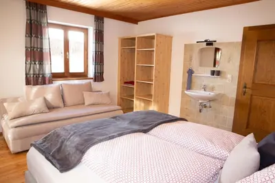 Ein Bett oder Betten in einem Zimmer der Unterkunft Haus Lindbichl