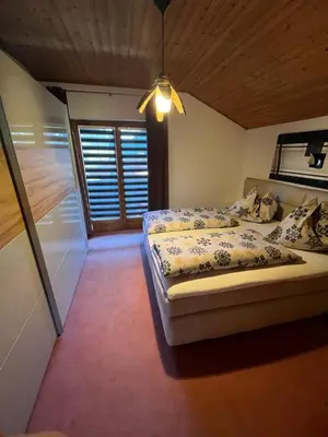 Ein Bett oder Betten in einem Zimmer der Unterkunft Haus Knauß