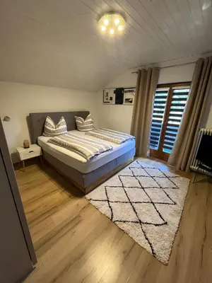 Ein Bett oder Betten in einem Zimmer der Unterkunft Haus Knauß