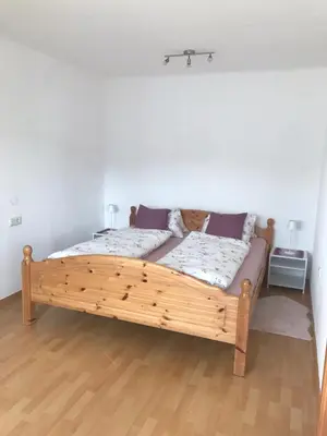 Ein Bett oder Betten in einem Zimmer der Unterkunft Ferienwohnung Lechnerhof