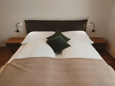 Ein Bett oder Betten in einem Zimmer der Unterkunft Appartement Waldplatzl