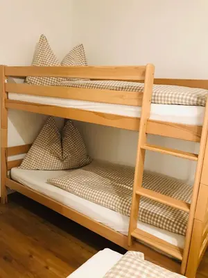 Ein Bett oder Betten in einem Zimmer der Unterkunft Bio Schartenhof