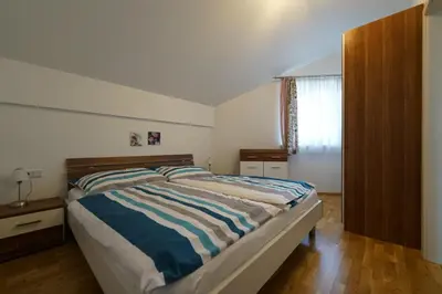 Ein Bett oder Betten in einem Zimmer der Unterkunft Bergheimat