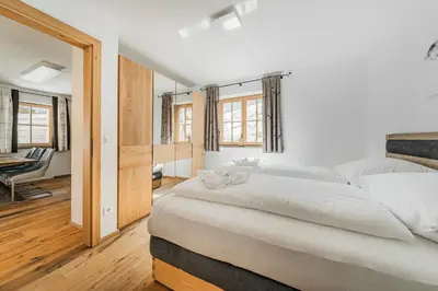 Ein Bett oder Betten in einem Zimmer der Unterkunft Dachstein West Apartment 1B