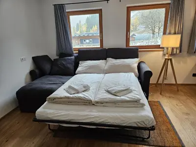 Ein Bett oder Betten in einem Zimmer der Unterkunft Lachtal-Zentral