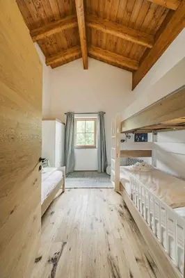 Ein Bett oder Betten in einem Zimmer der Unterkunft Dachstein West Apartment T4