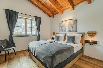 Ein Bett oder Betten in einem Zimmer der Unterkunft Dachstein West Apartment T5