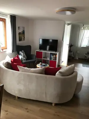 Ein Sitzbereich in der Unterkunft Ferienwohnung Am Jodlerweg