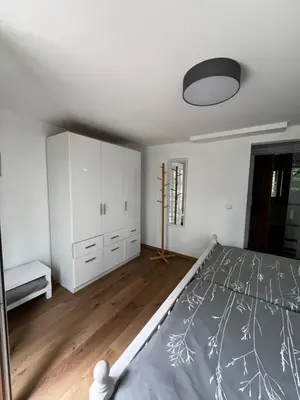 Ein Bett oder Betten in einem Zimmer der Unterkunft Ferienwohnung Am Jodlerweg