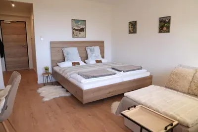 Ein Bett oder Betten in einem Zimmer der Unterkunft Bergblick 411 am Wolfgangsee