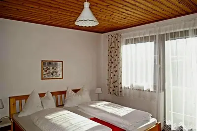 Ein Bett oder Betten in einem Zimmer der Unterkunft Haus Brigitte Rettensteiner