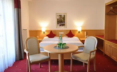 Ein Sitzbereich in der Unterkunft Heart Hotel Himmelberg