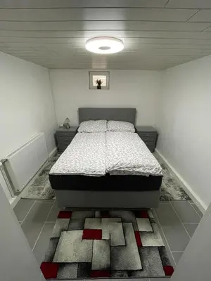 Ein Bett oder Betten in einem Zimmer der Unterkunft Dambach Appartement