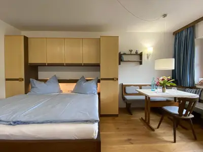Ein Bett oder Betten in einem Zimmer der Unterkunft Oberleiten Apartments