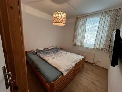 Ein Bett oder Betten in einem Zimmer der Unterkunft WM ENNSTAL