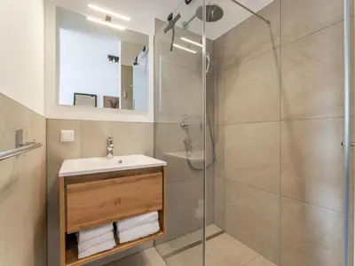 Ein Badezimmer in der Unterkunft Grebenzen Lodge Pabstin 36B