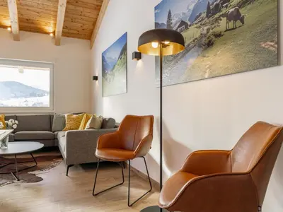 Ein Sitzbereich in der Unterkunft Grebenzen Lodge Pabstin 36B