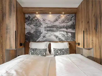 Ein Bett oder Betten in einem Zimmer der Unterkunft Grebenzen Lodge Pabstin 36B