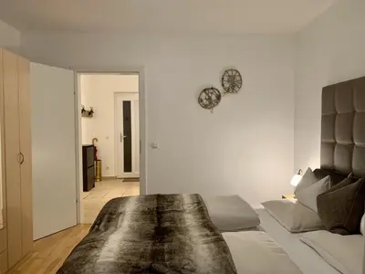 Ein Bett oder Betten in einem Zimmer der Unterkunft Almlodge Flachau