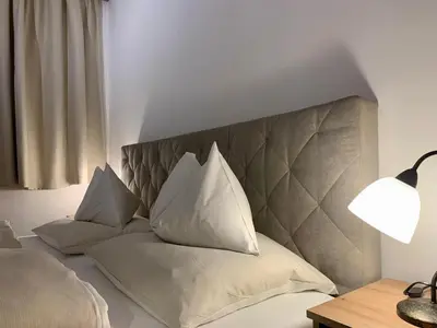 Ein Bett oder Betten in einem Zimmer der Unterkunft Almlodge Flachau