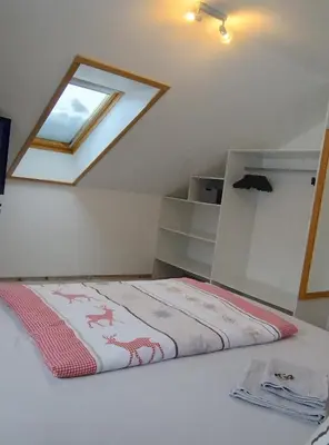 Ein Bett oder Betten in einem Zimmer der Unterkunft Ferienwohnung BergTime
