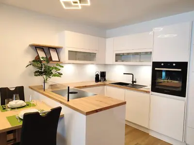 Küche/Küchenzeile in der Unterkunft Modern Mountain Apartment - free parking & sauna