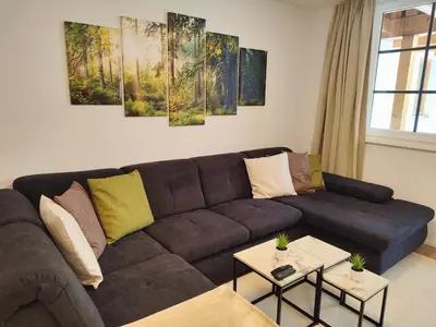 Ein Sitzbereich in der Unterkunft Modern Mountain Apartment - free parking & sauna