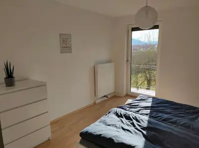 Ein Bett oder Betten in einem Zimmer der Unterkunft Ferienwohnung ländlich und in Seenähe
