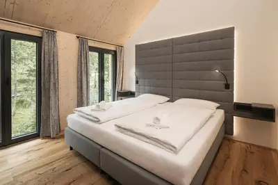 Ein Bett oder Betten in einem Zimmer der Unterkunft Rest Apartments & Suiten