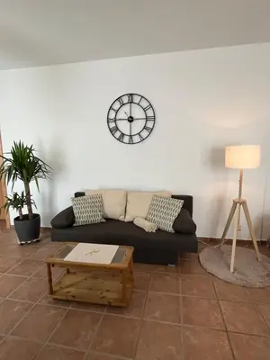 Ein Sitzbereich in der Unterkunft Ferienwohnung Broschek