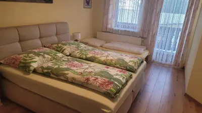Ein Bett oder Betten in einem Zimmer der Unterkunft Gästehaus Raab