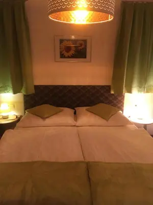 Ein Bett oder Betten in einem Zimmer der Unterkunft Ferienwohnung - Ferienhaus Kirchboden