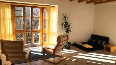 Ein Sitzbereich in der Unterkunft Apartment mit eigenem Garten in traumhafter Lage