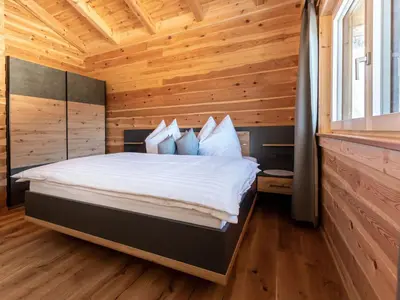 Ein Bett oder Betten in einem Zimmer der Unterkunft Holiday Home Alpenauszeit by Interhome