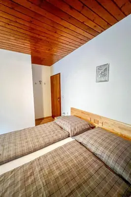 Ein Bett oder Betten in einem Zimmer der Unterkunft Apartment Sonnenhang by Interhome