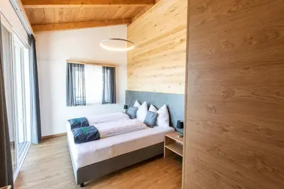 Ein Bett oder Betten in einem Zimmer der Unterkunft Seisen Almchalet