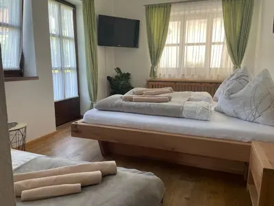 Ein Bett oder Betten in einem Zimmer der Unterkunft Luserblick