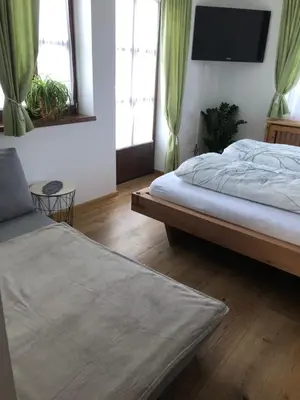 Ein Bett oder Betten in einem Zimmer der Unterkunft Luserblick