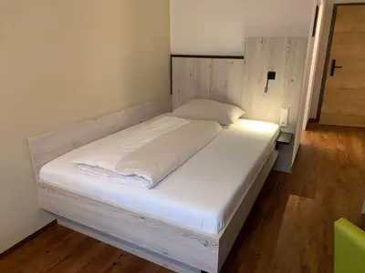 Ein Bett oder Betten in einem Zimmer der Unterkunft wild & bolz eMotel