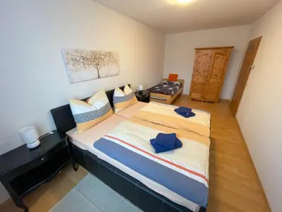 Ein Bett oder Betten in einem Zimmer der Unterkunft Ferienwohnung Lena