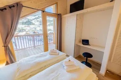 Ein Bett oder Betten in einem Zimmer der Unterkunft Chalet Bavaria