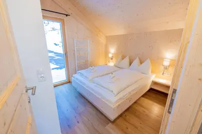 Ein Bett oder Betten in einem Zimmer der Unterkunft Chalet Bavaria