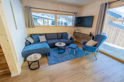 Ein Sitzbereich in der Unterkunft Chalet Bavaria