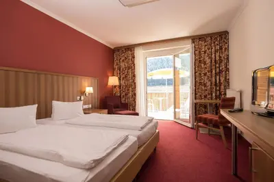 Ein Bett oder Betten in einem Zimmer der Unterkunft Gesundheits- & Wellness Resort Oberzeiring