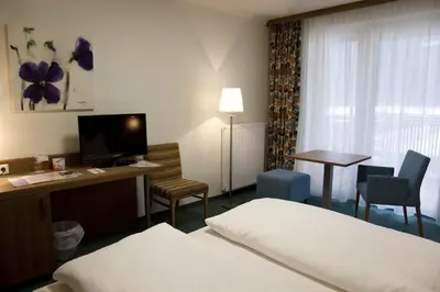 Ein Bett oder Betten in einem Zimmer der Unterkunft Gesundheits- & Wellness Resort Oberzeiring