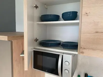 Küche/Küchenzeile in der Unterkunft Schöne Ferienwohnung mit Wolfgangseeblick