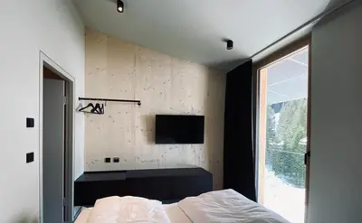 Ein Bett oder Betten in einem Zimmer der Unterkunft Hideaway Planneralm operated by JUFA Hotels