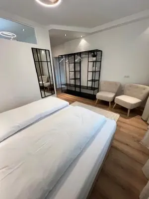 Ein Bett oder Betten in einem Zimmer der Unterkunft Sonnhang Apartment Unterkofler