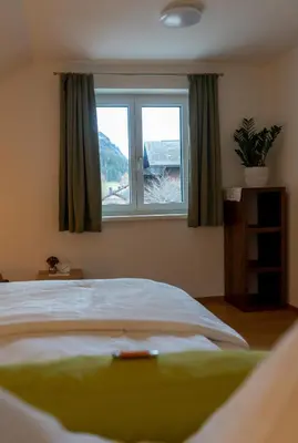 Ein Bett oder Betten in einem Zimmer der Unterkunft s`Hauserl 311 - Your Austrian Home