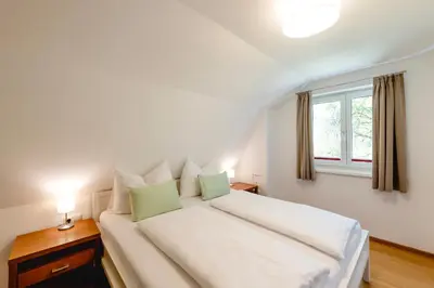 Ein Bett oder Betten in einem Zimmer der Unterkunft s`Hauserl 311 - Your Austrian Home